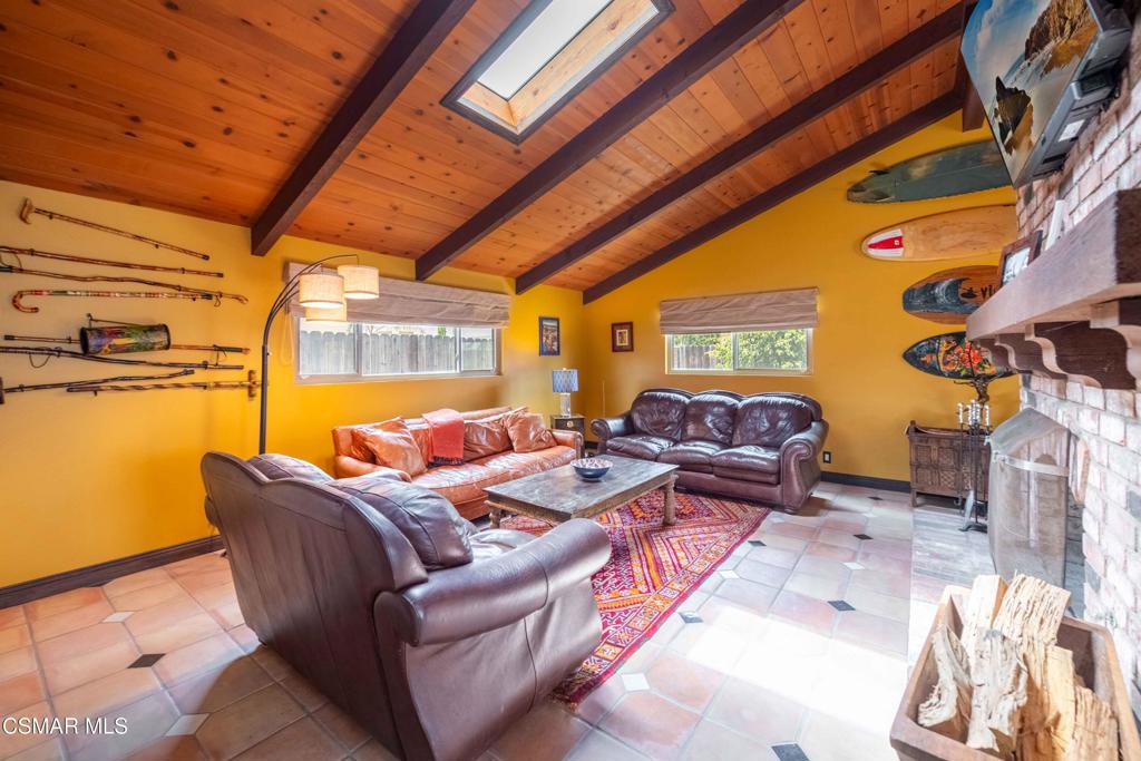 5121 Breakwater Way Oxnard, CA 93035 - Photo 7 of 54 a living room with furniture and a floor to ceiling window