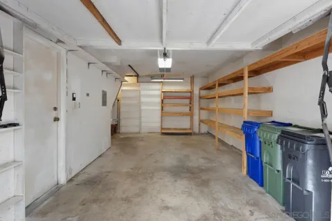 a view of a room with wooden walls