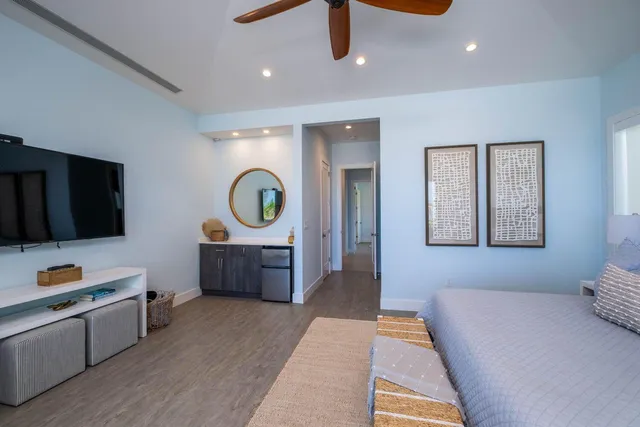 a bathroom with a double vanity sink mirror and toilet