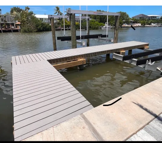 a view of swimming pool with seating space and barbeque oven
