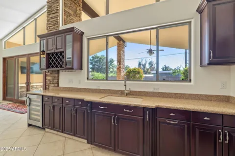 a kitchen with a sink and a window