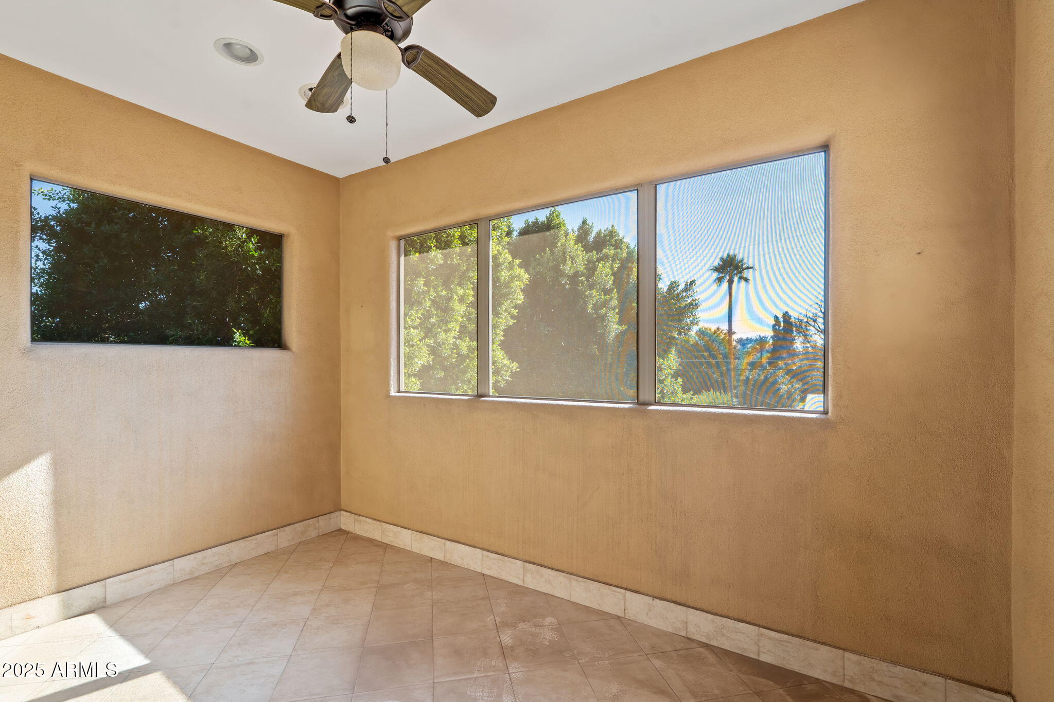 1435 East Rancho Drive Phoenix, AZ 85014 - Photo 41 of 52 a view of an empty room with a window