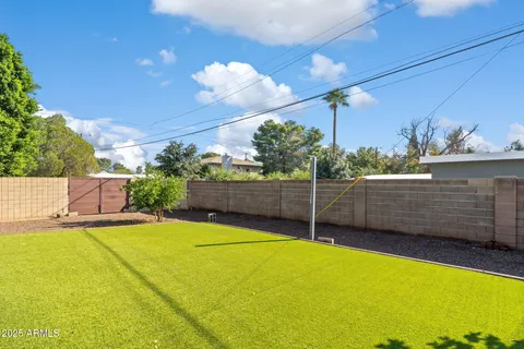 a view of a livingroom with a patio and furniture