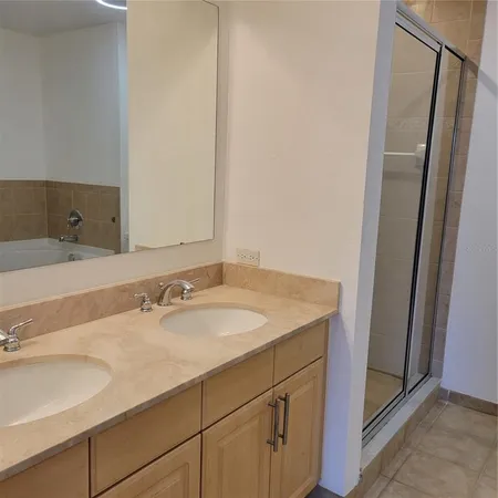 a bathroom with a bathtub and toilet
