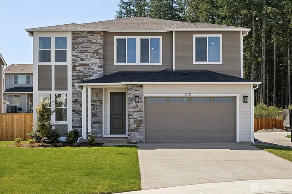 a front view of house with yard