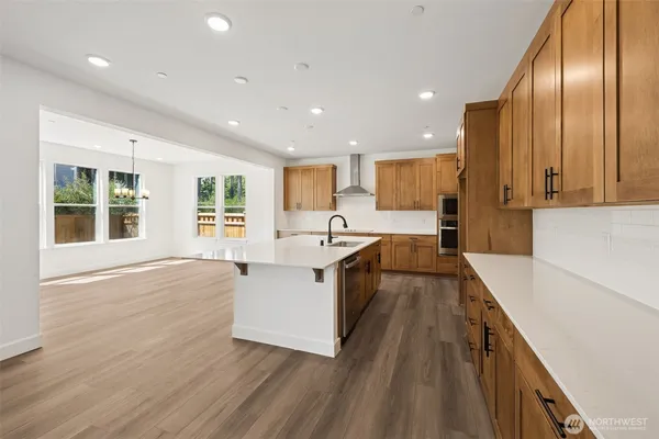 a large kitchen with cabinets