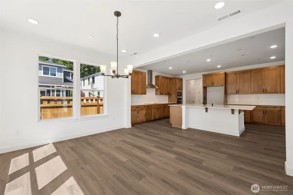 a view of kitchen with furniture and window