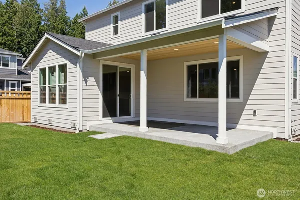 a view of front of house with a yard