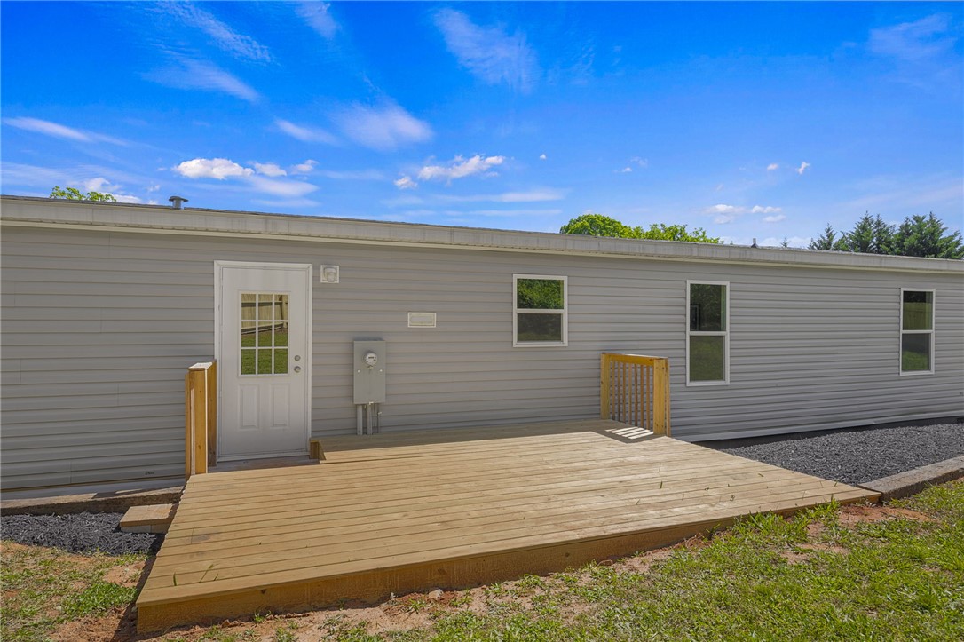375 Griggs Road Six Mile, SC 29682 - Photo 26 of 36 This charming residence features an expansive deck, perfect for outdoor enjoyment and serene moments.