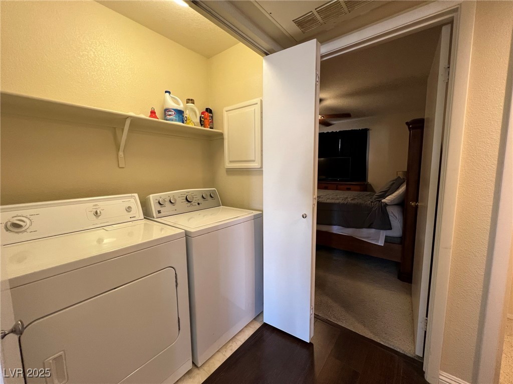 8410 Eldora Avenue, Unit 2020 Las Vegas, NV 89117 - Photo 9 of 10 Laundry area featuring visible vents, ceiling fan,