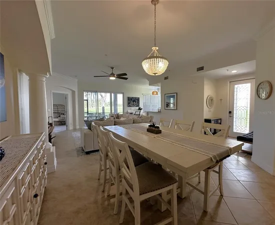 a kitchen with a table and chairs in it