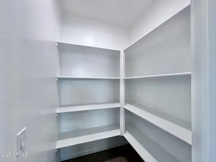 an empty room with a bathroom