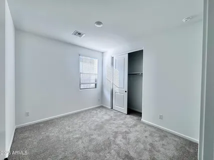 a view of car parked on the side of road