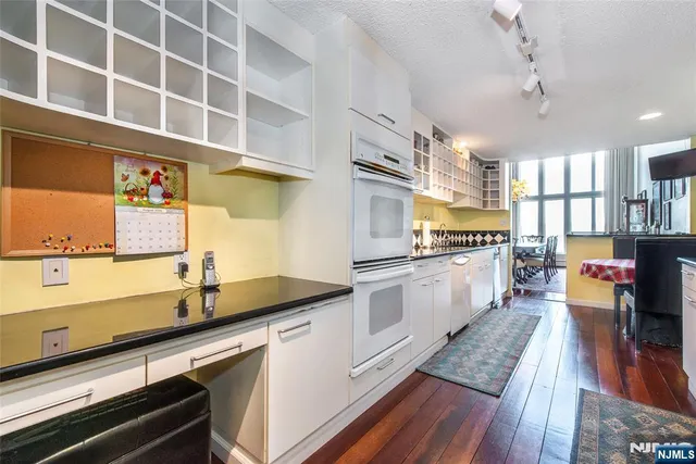 a kitchen with granite countertop lots of counter top space