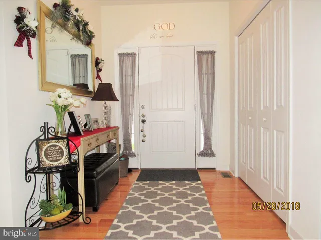 a view of a entryway with wooden floor