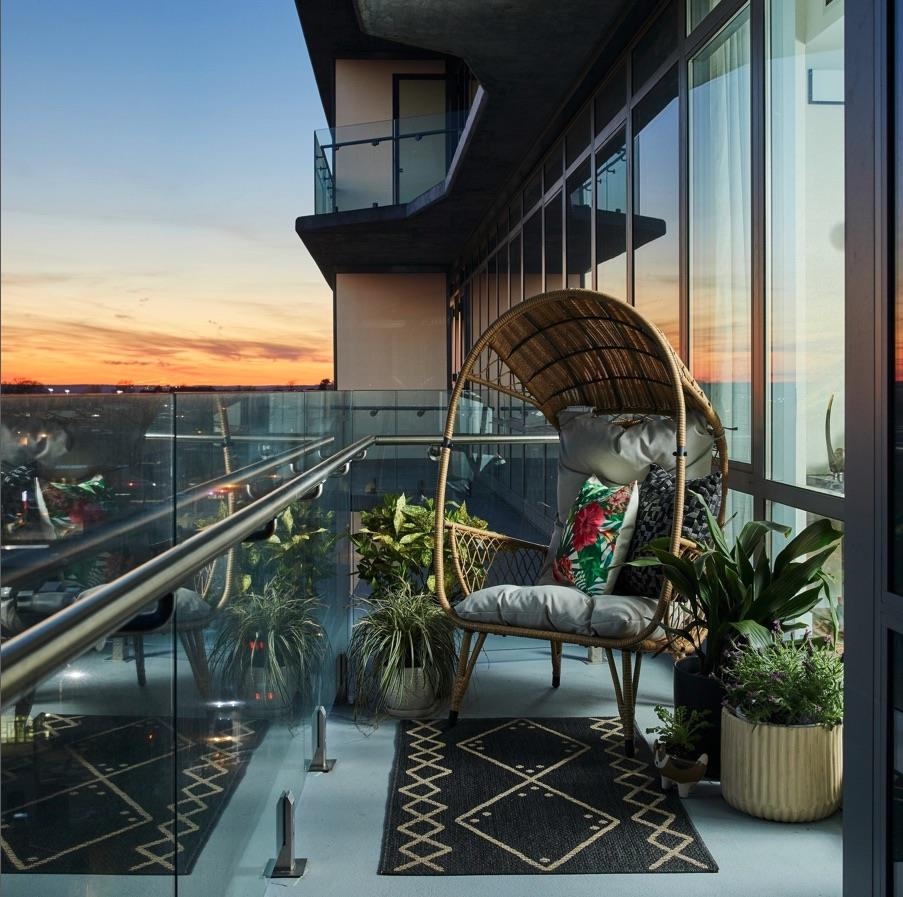 320 Adolphus Avenue, Unit 815 Cliffside Park, NJ 07010 - Photo 6 of 25 a balcony with table chairs and potted plants