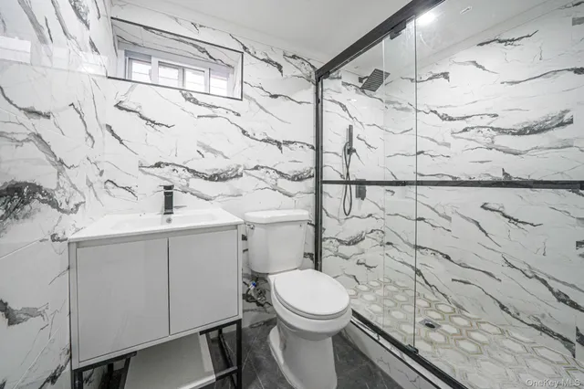 $879,000 | 214-07 110th Avenue | Bellaire Estates