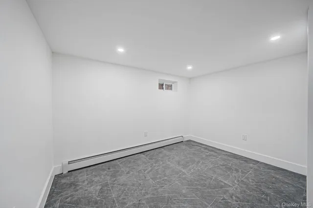 $879,000 | 214-07 110th Avenue | Bellaire Estates