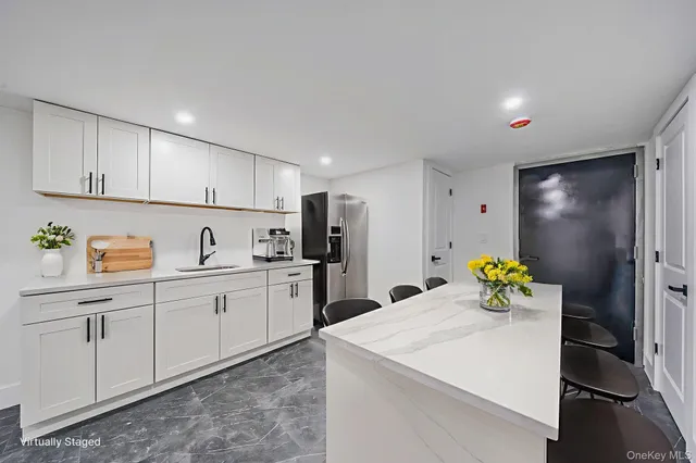 $879,000 | 214-07 110th Avenue | Bellaire Estates