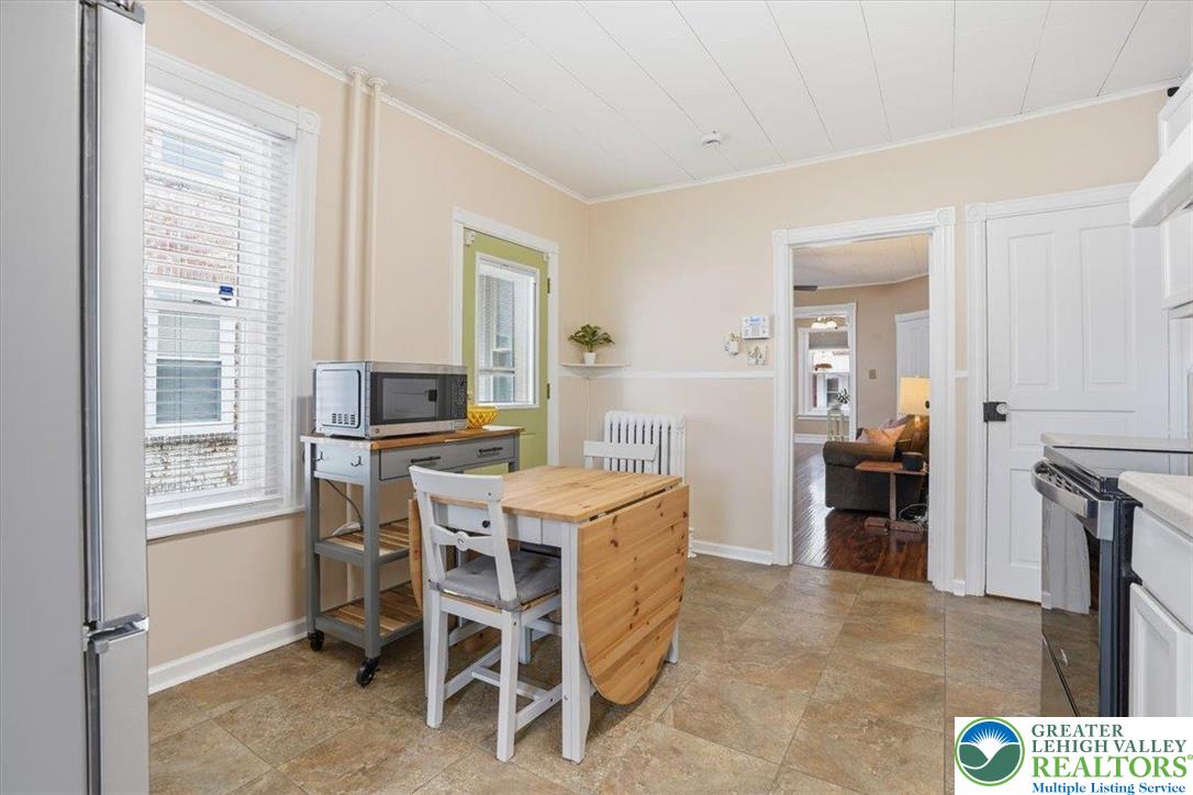 525 Ridge Street Emmaus, PA 18049 - Photo 26 of 68 This cozy eat-in kitchen features practical appliances and durable flooring, perfect for daily living.