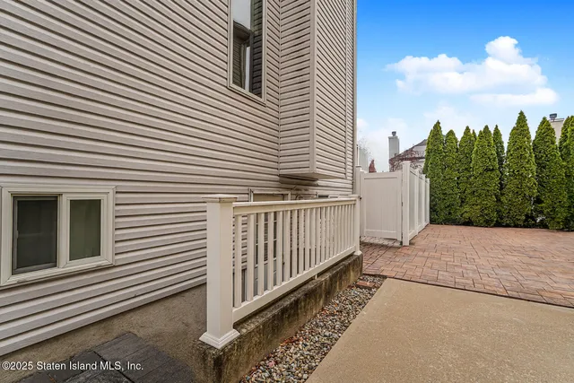 a view of swimming pool with seating space