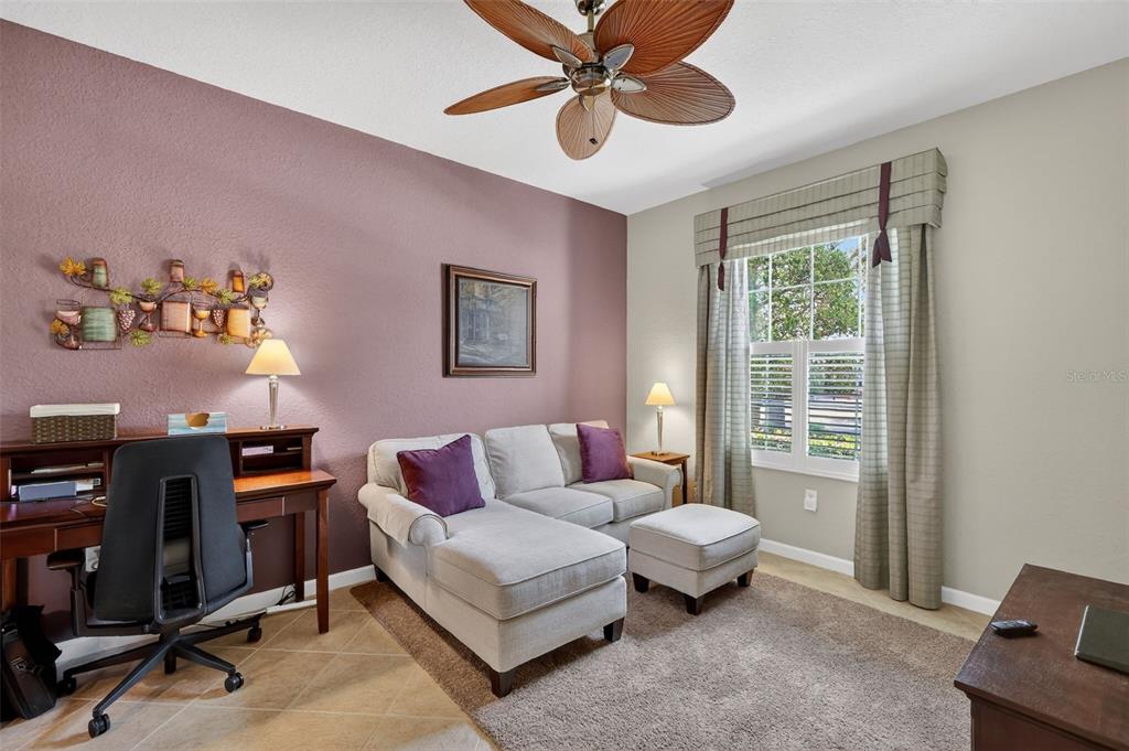 7271 Southwest 95th Court Ocala, FL 34481 - Photo 14 of 39 a living room with furniture and a window