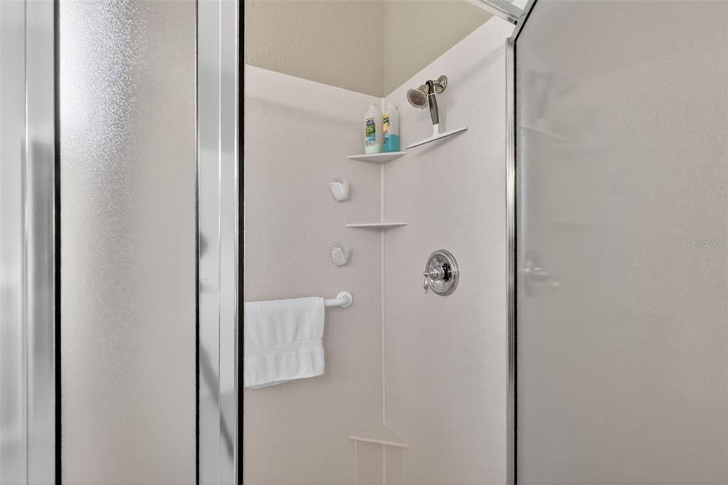 7271 Southwest 95th Court Ocala, FL 34481 - Photo 24 of 39 a bathroom with a shower