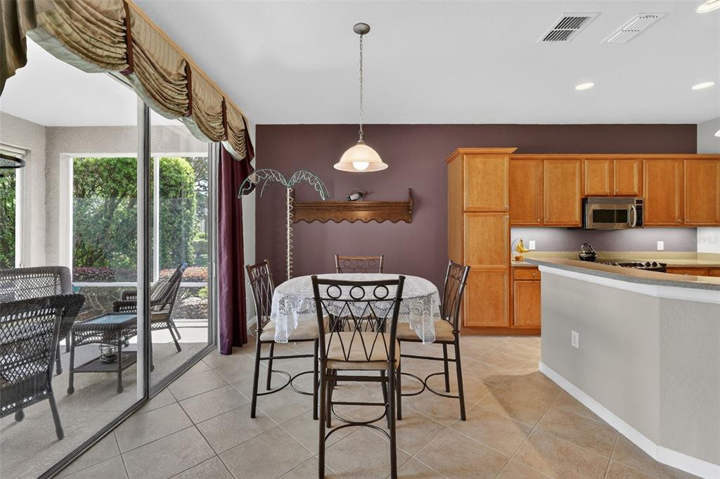 7271 Southwest 95th Court Ocala, FL 34481 - Photo 4 of 39 a view of a dining room with furniture window and outside view