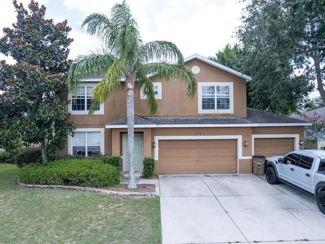a house view with a garden space