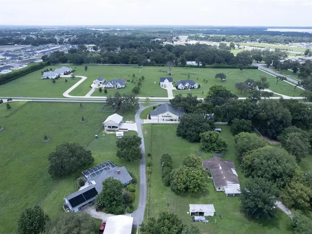 an aerial view of a city with lots of residential buildings