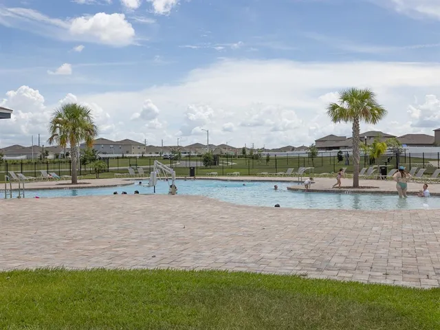 a view of a lake with a big yard