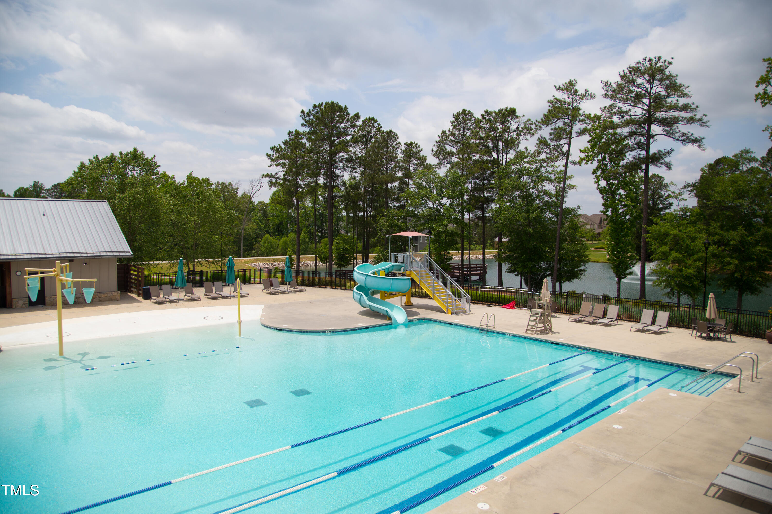2430 Whitewing Lane Wendell, NC 27591 - Photo 21 of 31 a view of a house with swimming pool and sitting area