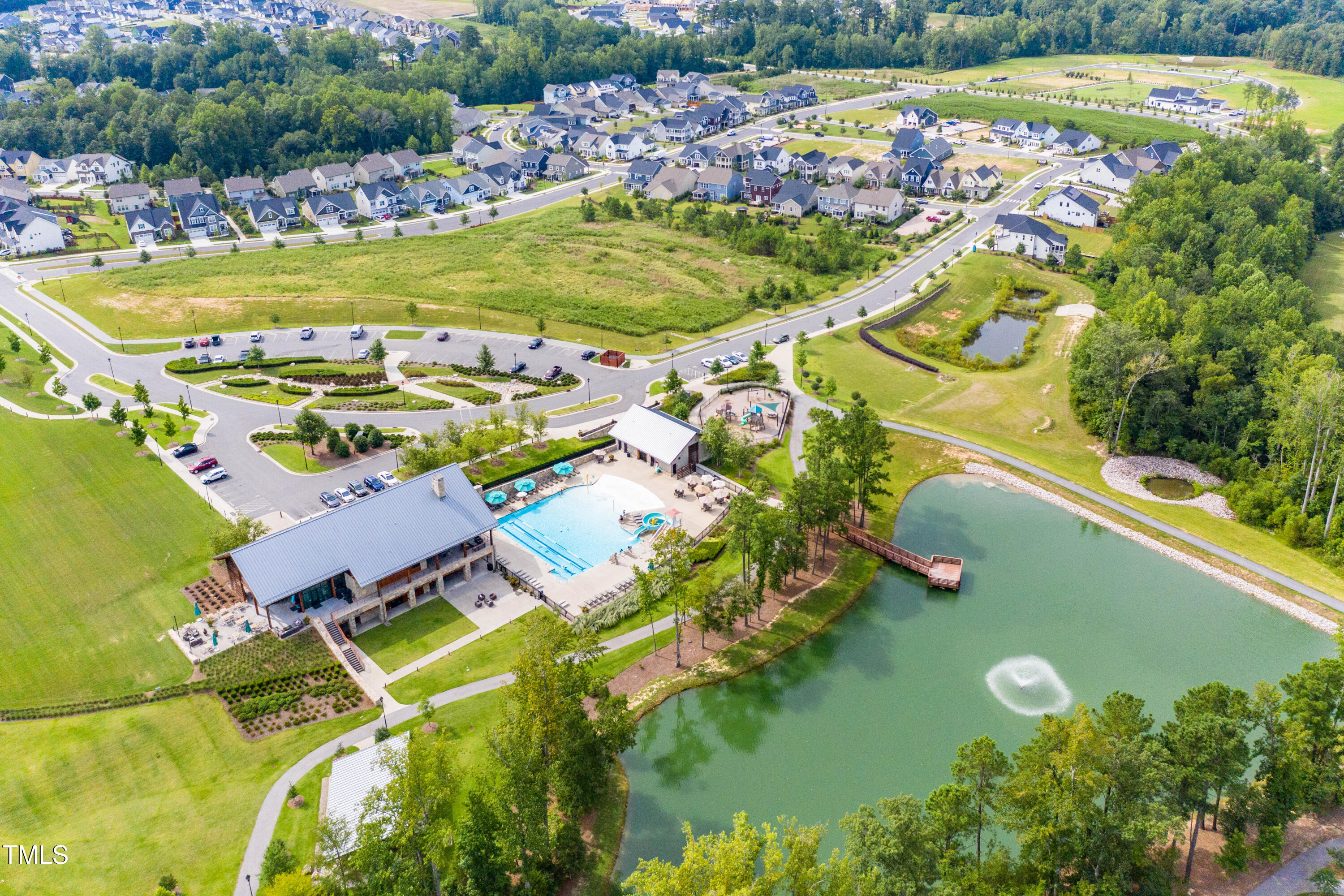 2430 Whitewing Lane Wendell, NC 27591 - Photo 26 of 31 an aerial view of a residential houses with outdoor space and a lake view