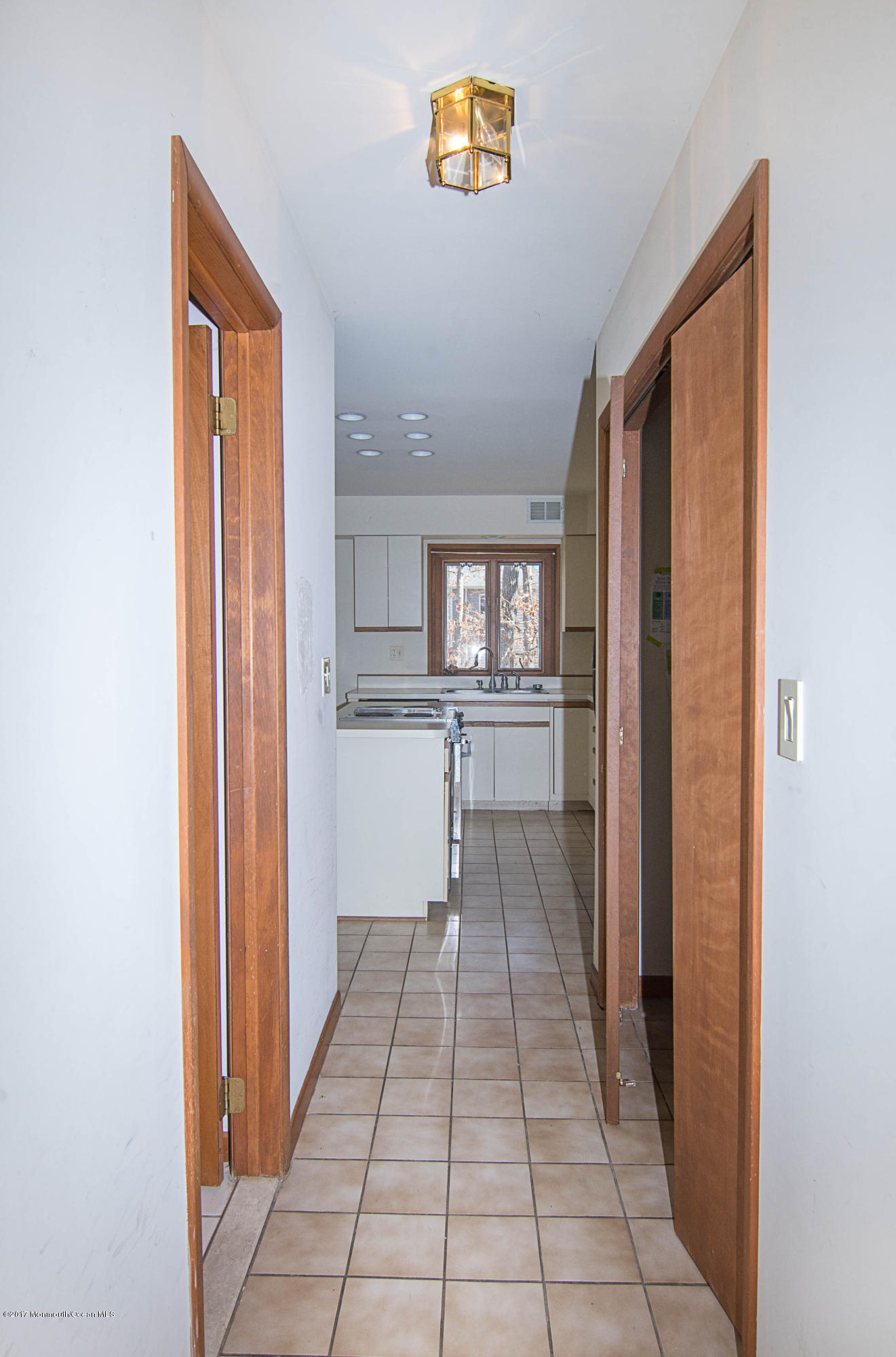 951 Toms River Road Jackson, NJ 08527 - Photo 18 of 32 _RMJ7803.jpg edit hallway to kitchen