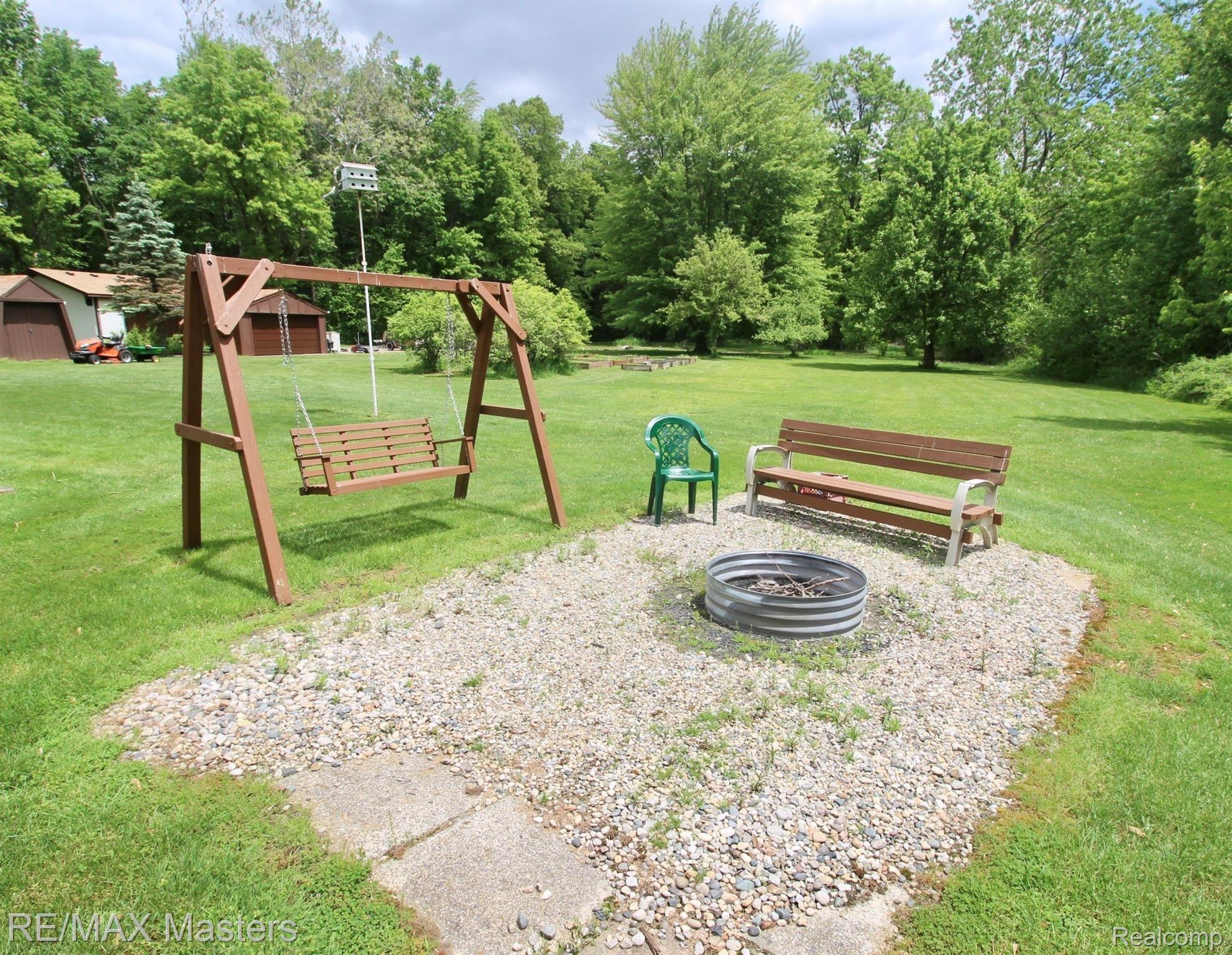 25777 Inkster Road Flat Rock, MI 48134 - Photo 42 of 52 Enjoy MIchigan summers around the campfire, roast marshmellows, get away from it all without the drive up north!! It's all right here.