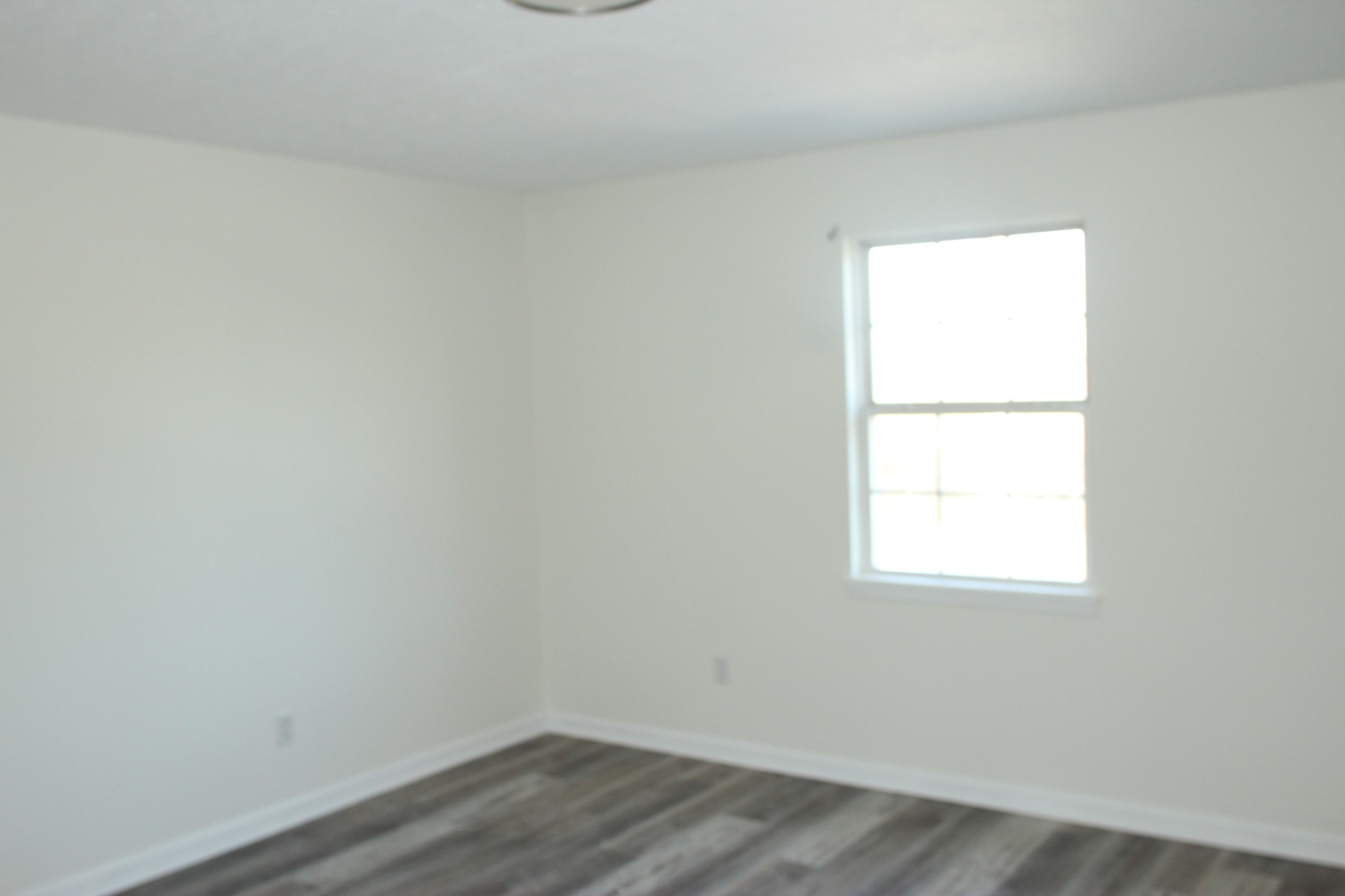 517 Bybee Branch Road, Unit 43 McMinnville, TN 37110 - Photo 13 of 14 an empty room with a window
