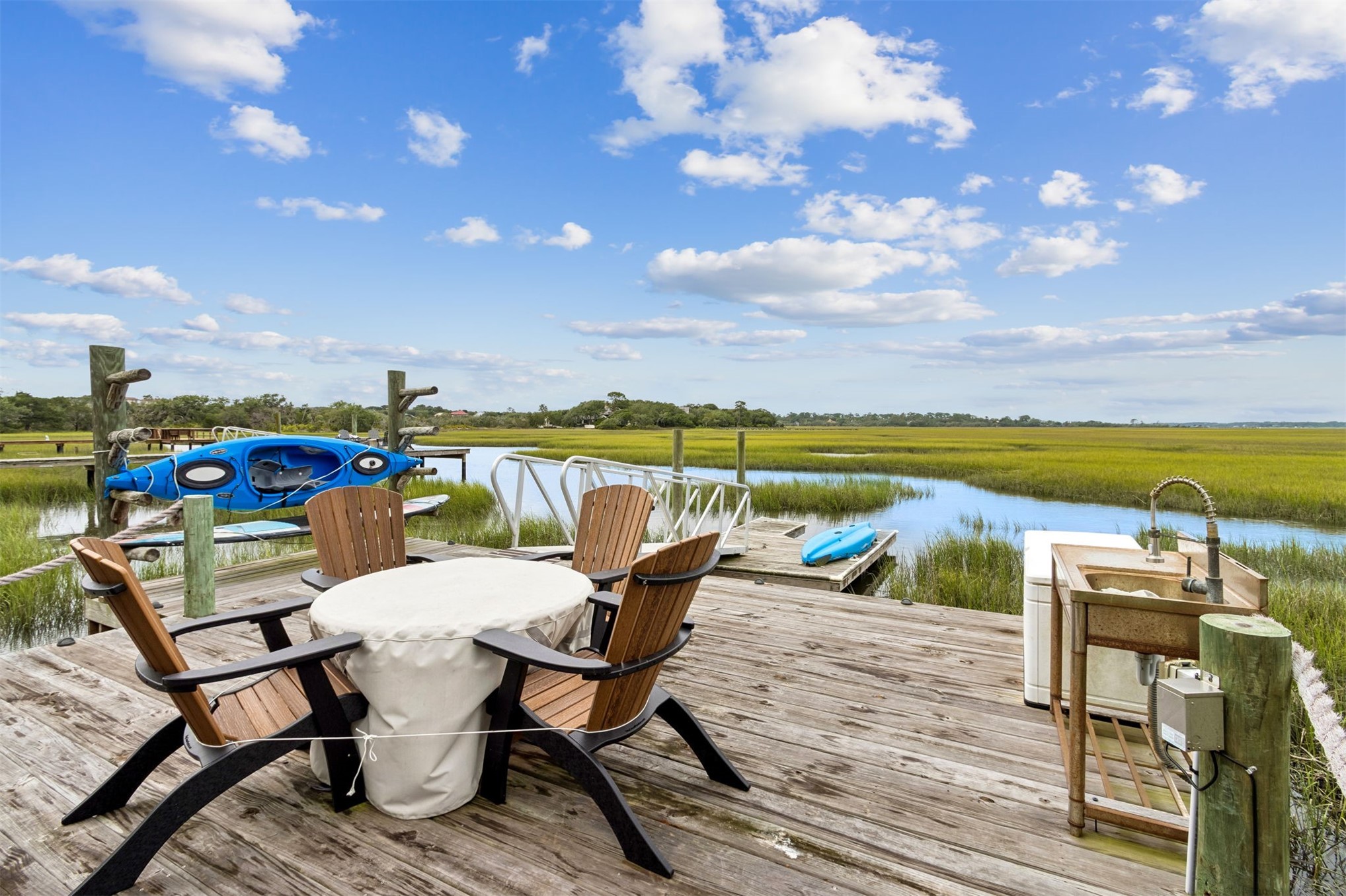 12 Marsh Point Road Fernandina Beach, FL 32034 - Photo 34 of 79 a view of swimming pool with outdoor seating and ocean view