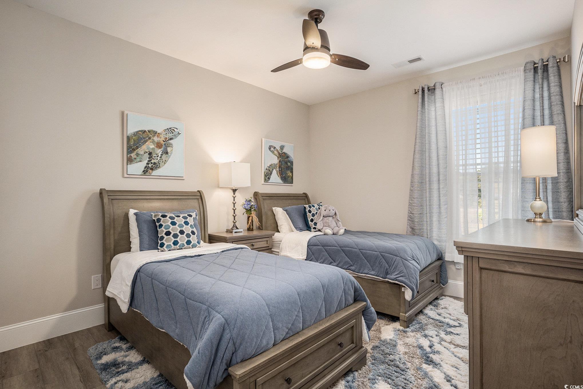 1009 Dowitcher Drive Conway, SC 29526 - Photo 19 of 40 Bedroom featuring wood finished floors and a ceiling fan