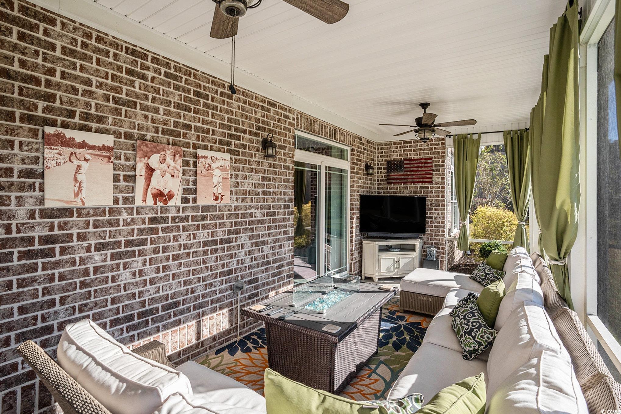 1009 Dowitcher Drive Conway, SC 29526 - Photo 30 of 40 View of patio with outdoor lounge area and a ceiling fan