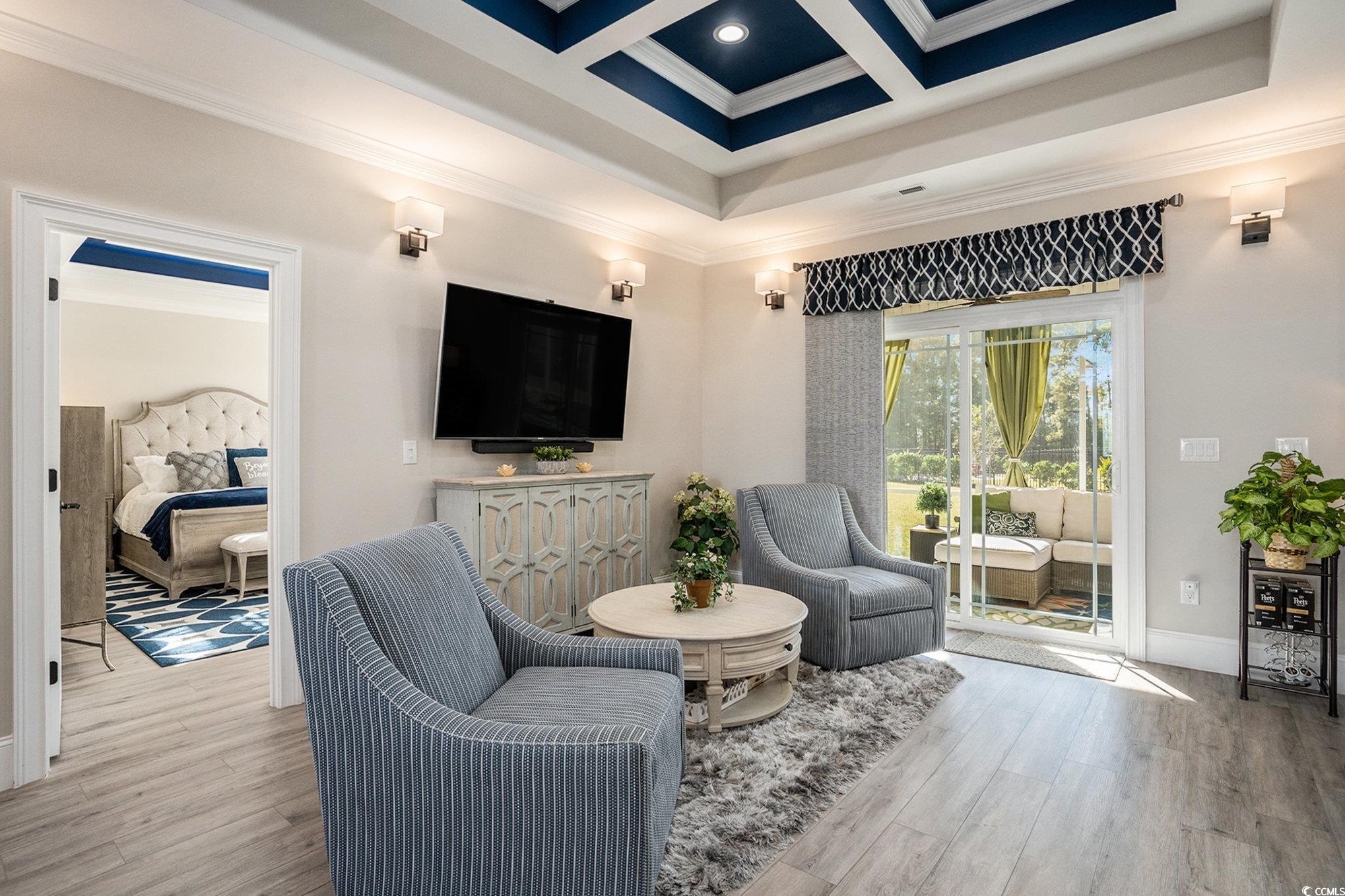 1009 Dowitcher Drive Conway, SC 29526 - Photo 9 of 40 Sitting room with crown molding, coffered ceiling, wood finished floors, and beam ceiling