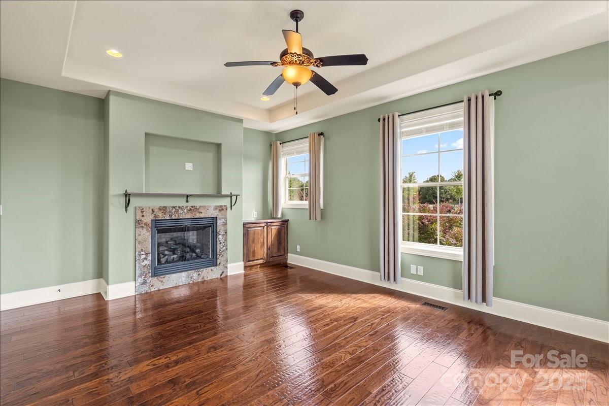 220 Fincher Road Pauline, SC 29374 - Photo 32 of 48 a view of an empty room with a fireplace and a window