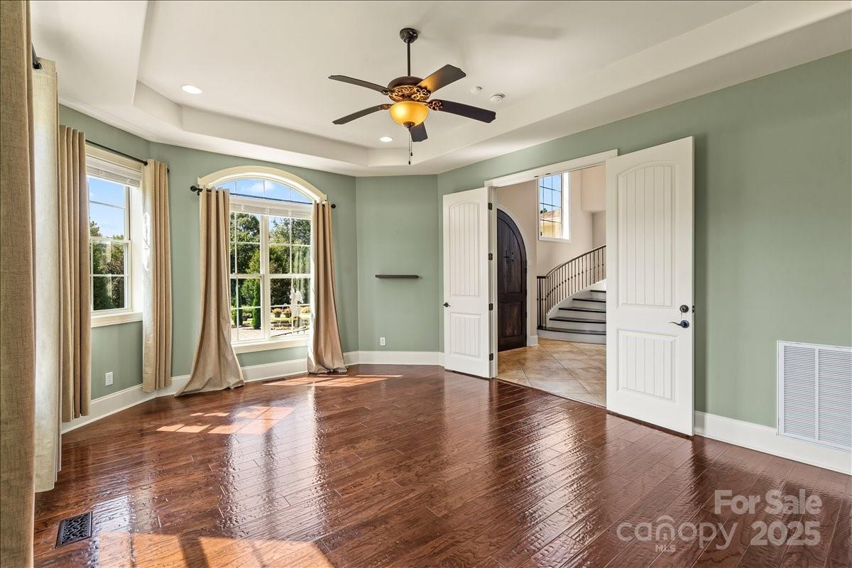 220 Fincher Road Pauline, SC 29374 - Photo 33 of 48 a view of empty room with wooden floor and fan