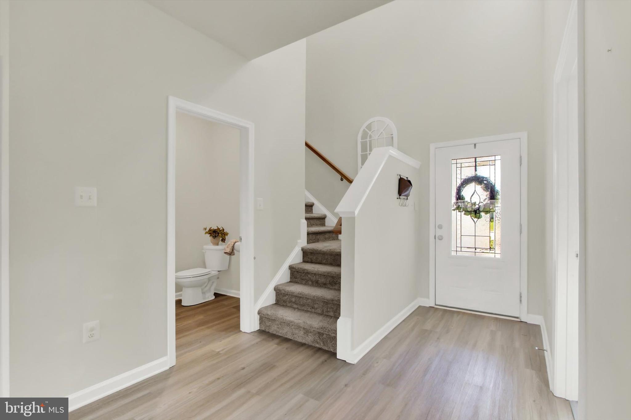 251 Piedmont Way Hanover, PA 17331 - Photo 3 of 29 a view of entryway with stairs and wooden floor
