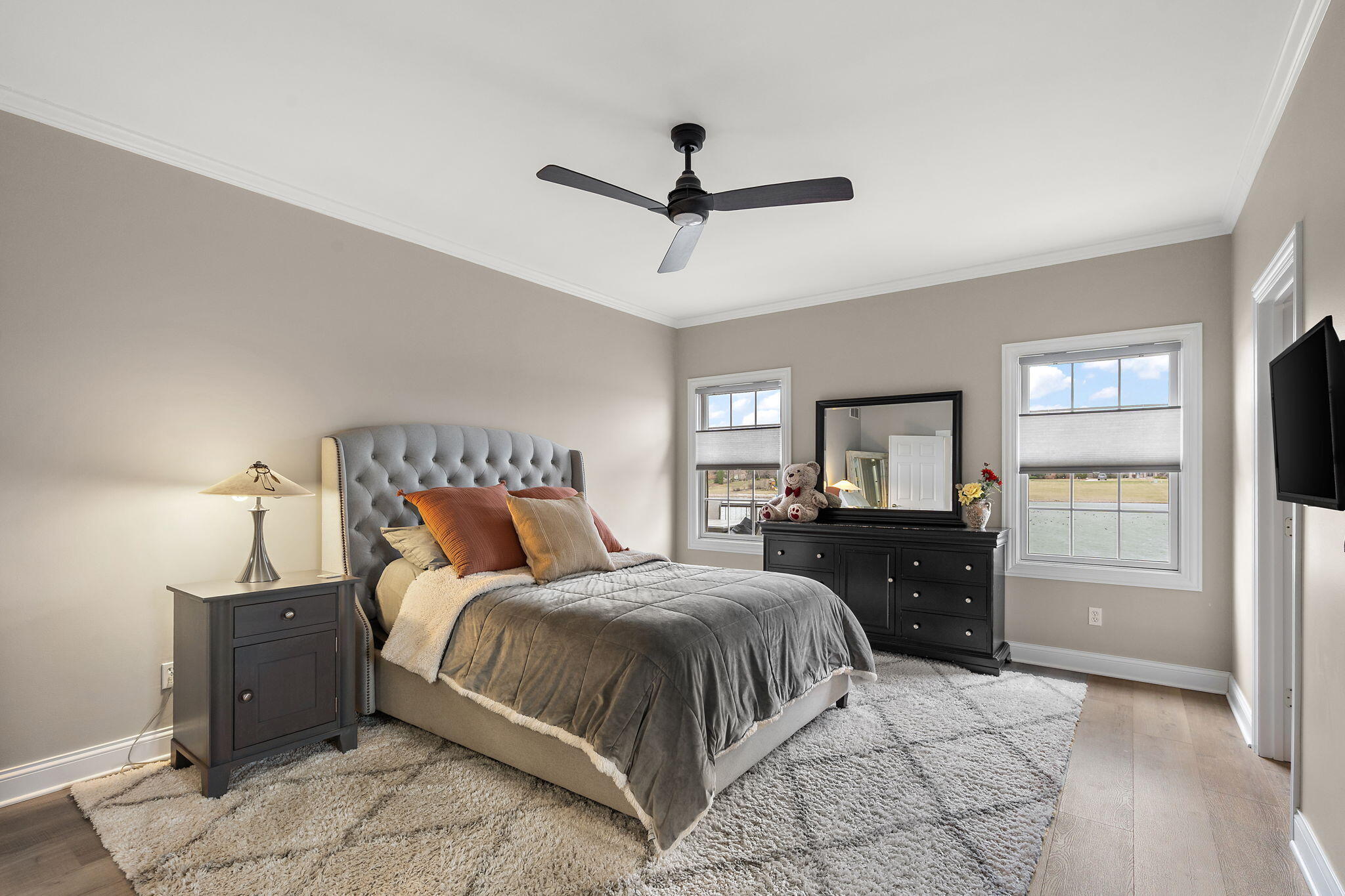 8331 Doubletree Drive North Crown Point, IN 46307 - Photo 21 of 49 a bedroom with a bed and a dresser