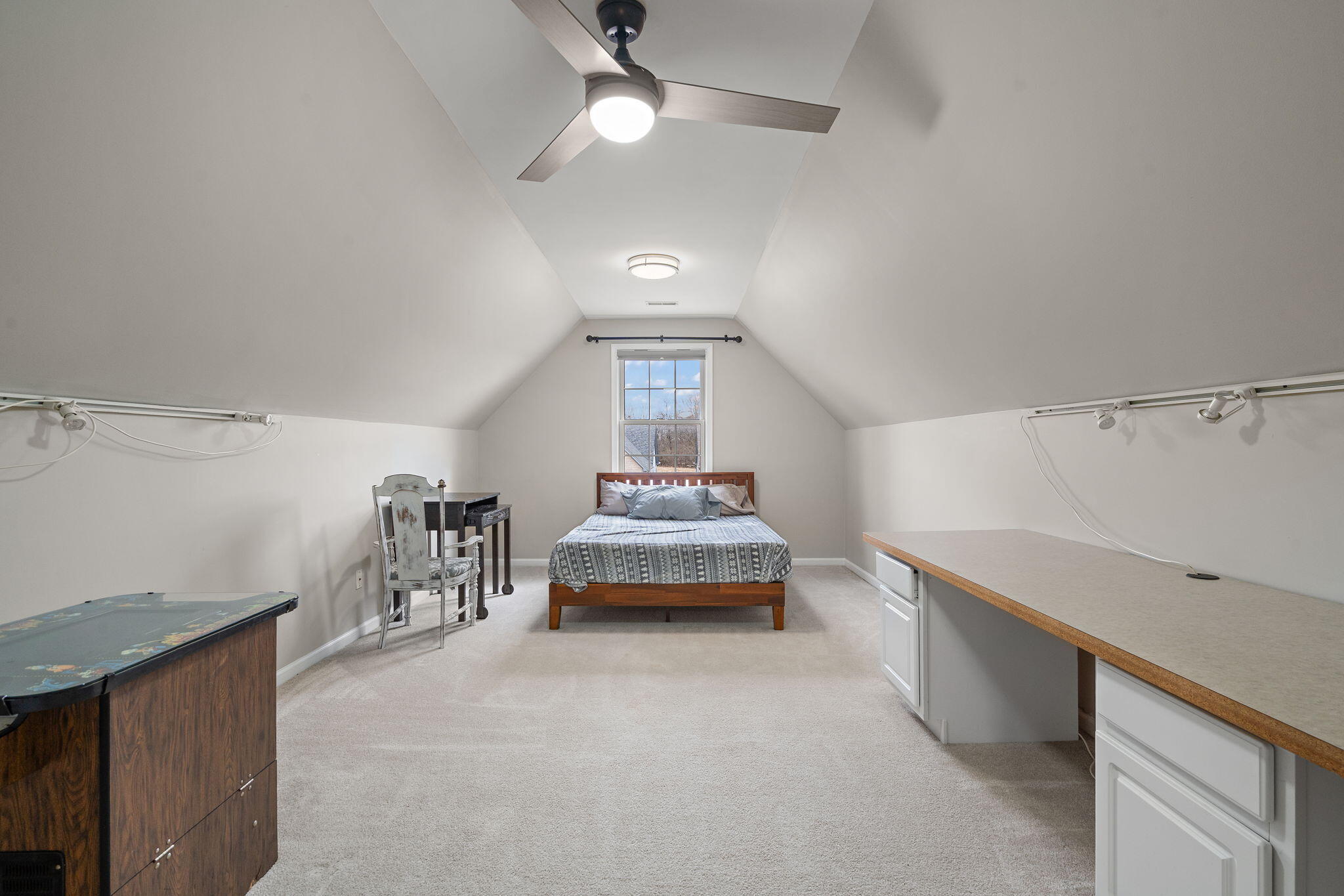 8331 Doubletree Drive North Crown Point, IN 46307 - Photo 40 of 49 a spacious bedroom with a bed and a chandelier