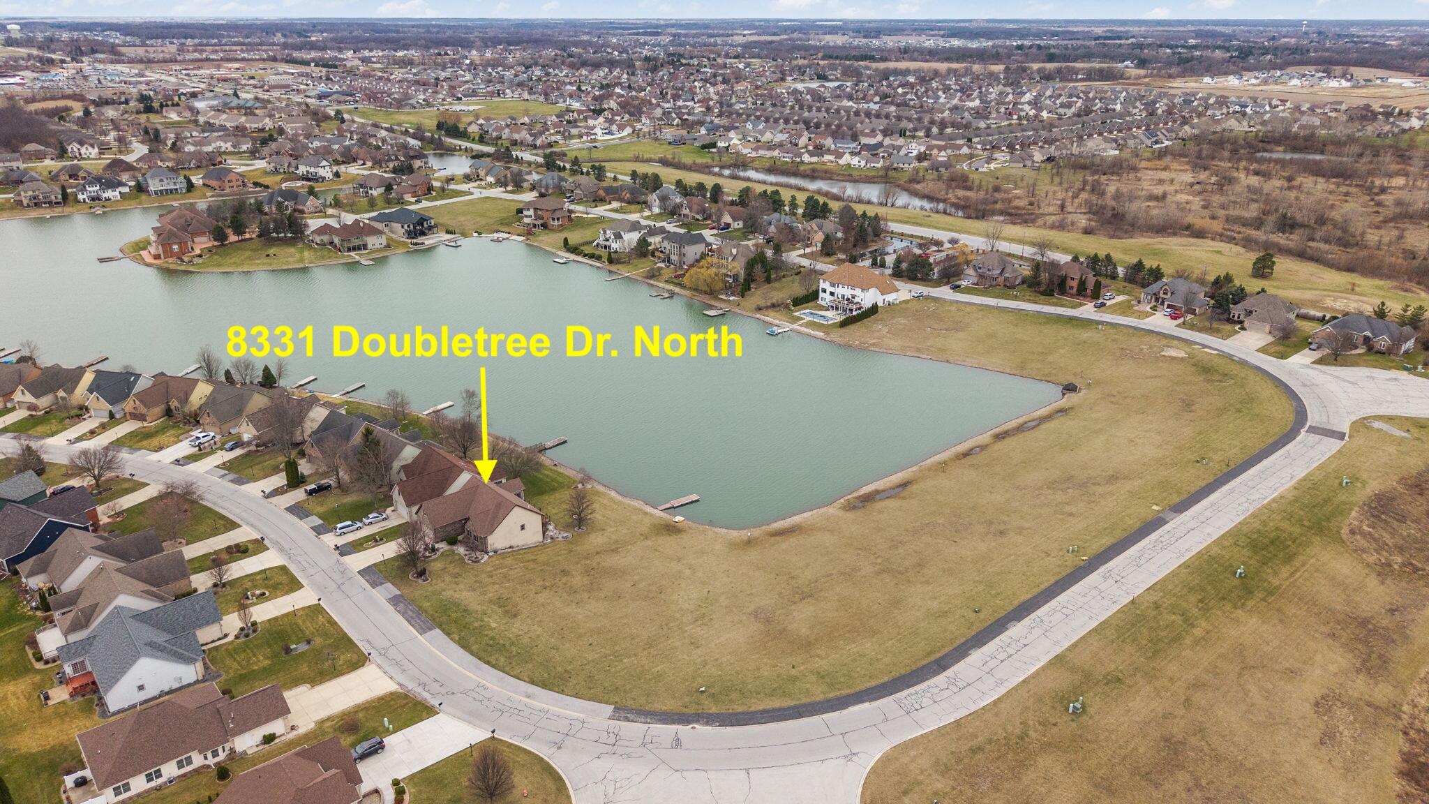 8331 Doubletree Drive North Crown Point, IN 46307 - Photo 43 of 49 an aerial view of a house with a lake view