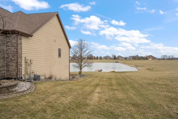 a view of an house with beach and ocean view