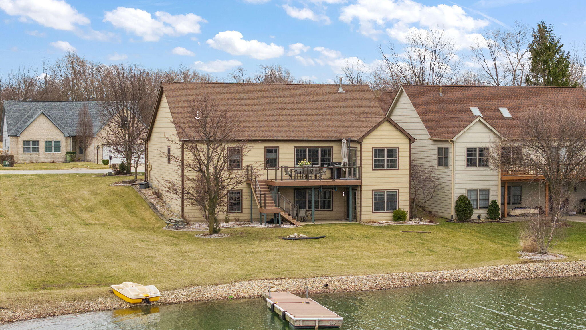 8331 Doubletree Drive North Crown Point, IN 46307 - Photo 6 of 49 a view of a house with swimming pool and sitting area