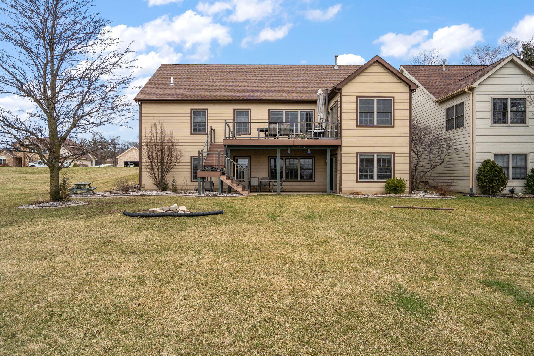 8331 Doubletree Drive North Crown Point, IN 46307 - Photo 7 of 49 a front view of a house with a yard