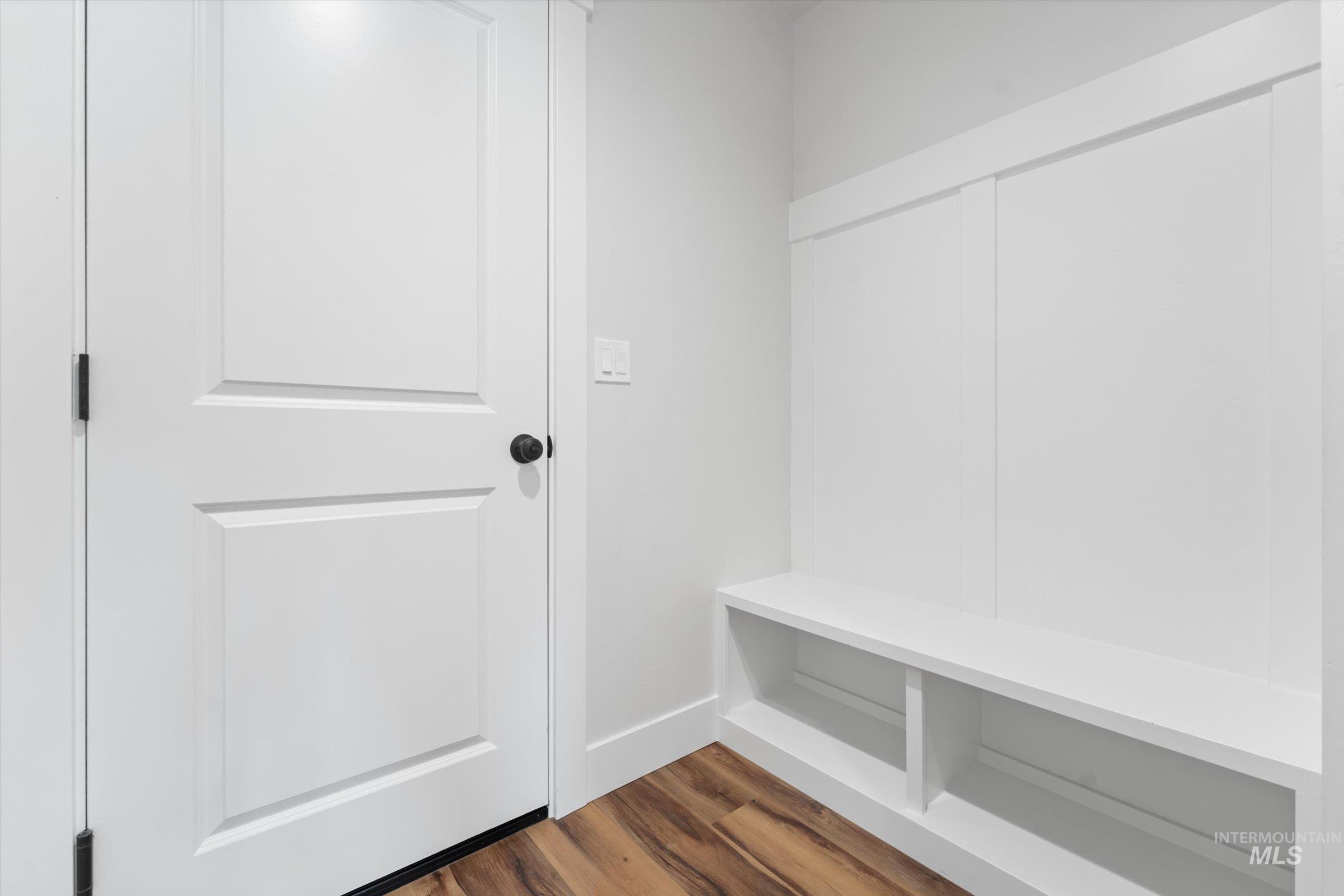 1142 Velvet Loop Wilder, ID 83676 - Photo 20 of 27 Mudroom featuring dark wood finished floors and baseboards